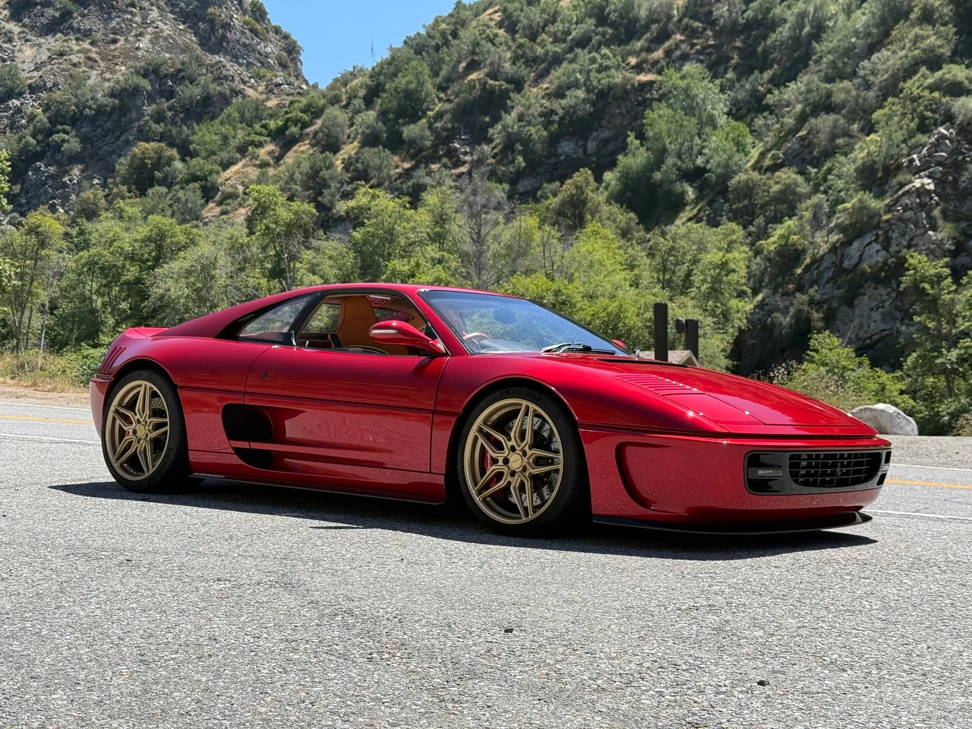 My my my, for only $770k (*ahem* $770k PLUS your non-crashed Ferrari F355), you can have this: the 355 by Evoluto. Think of it as the Guntherwerks of Ferrari 355's: 420 HP, 3000 lbs, 8500 RPM, and a fuckin sixteen page list of things that get changed