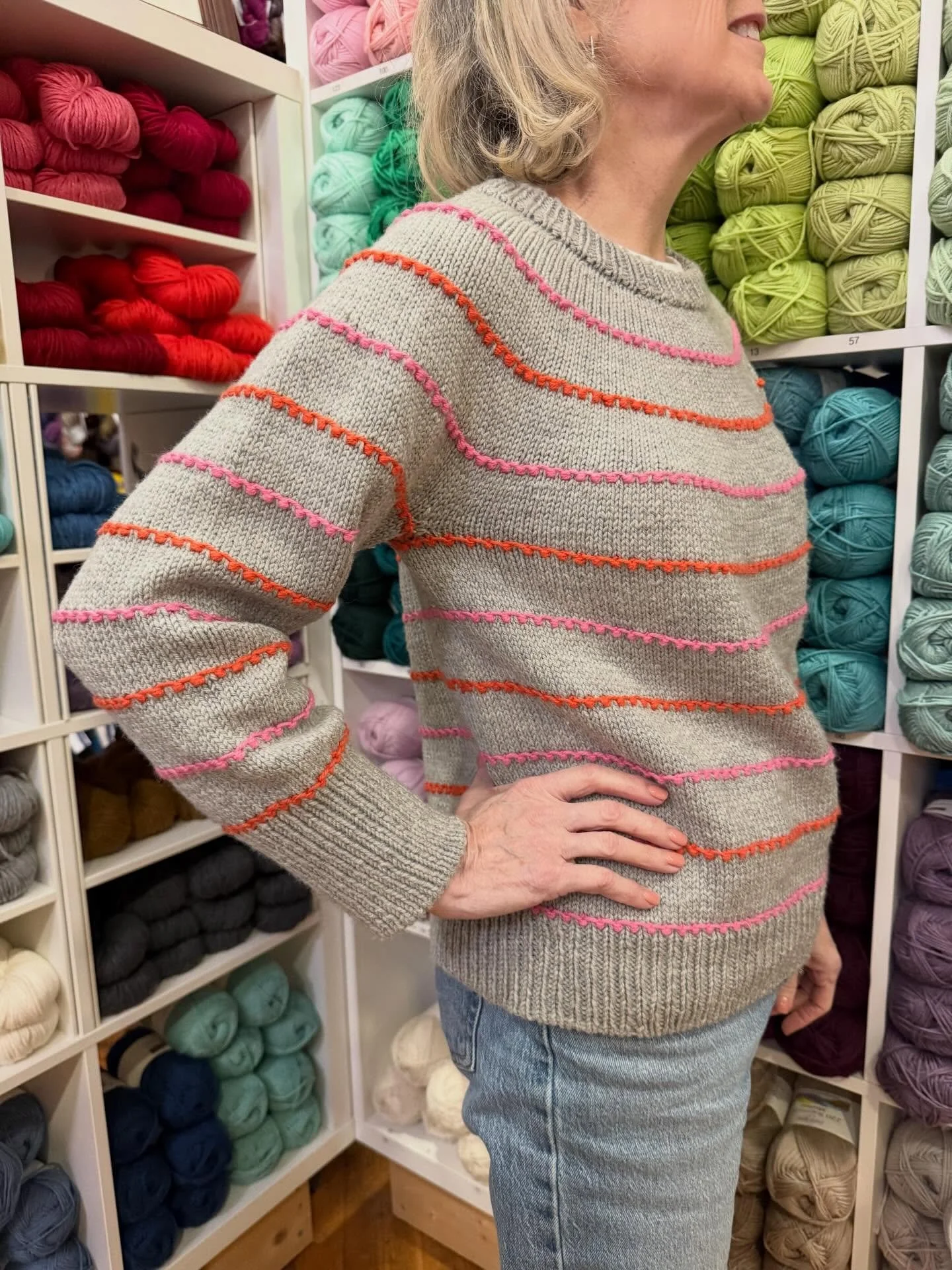 Melissa wore her Festival Sweater My Size by @petiteknit, and we thought you might like to see it! She used Cascade 220 Superwash Merino in color 26 Silver Heather for the Main and scraps of pink and orange for the Contrast colors. 

What a cute scra