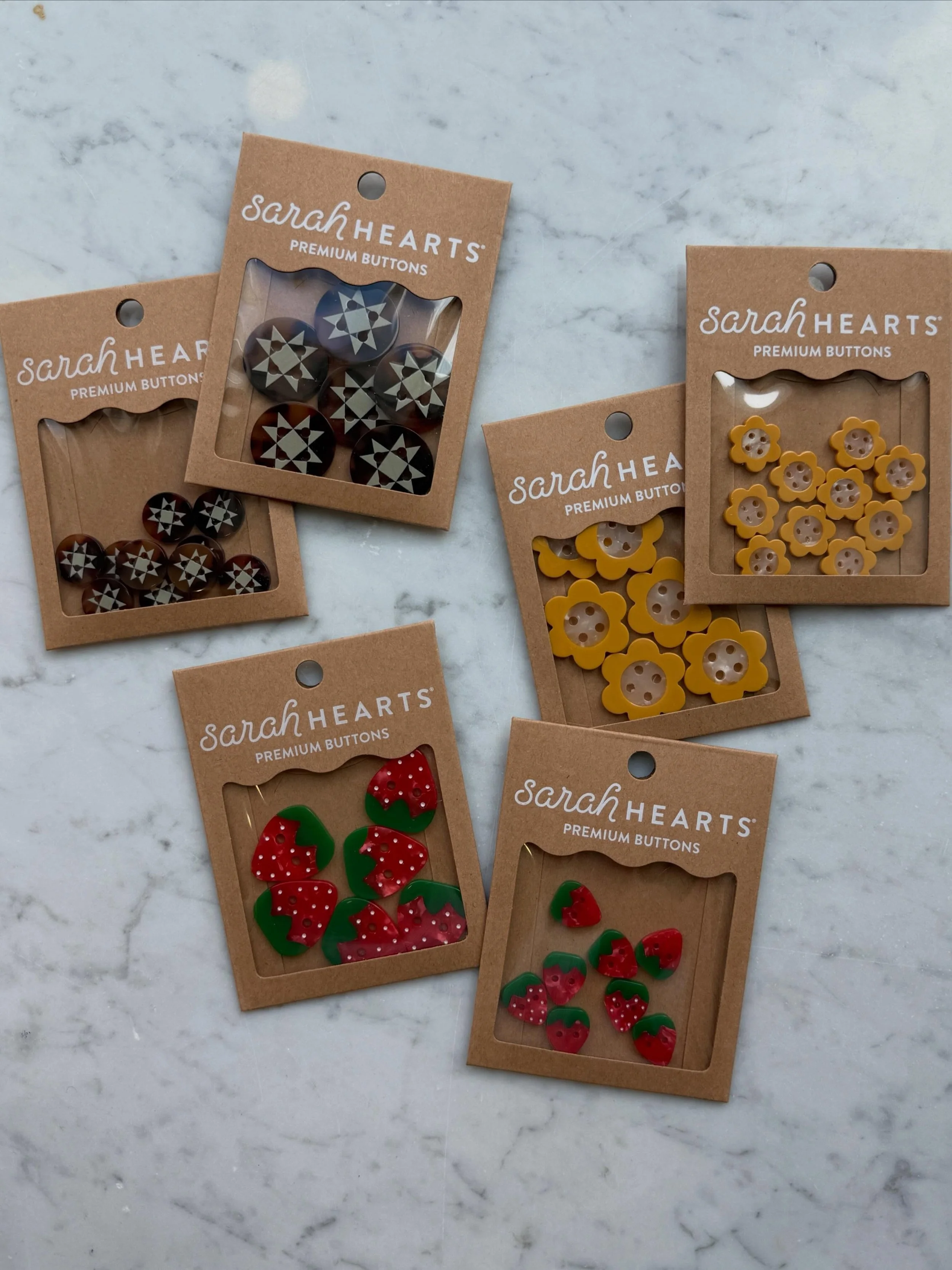 ❤️ NEW Sarah Hearts Buttons, Labels, Stickers and Button Hair Clips! These are like candy -- the more the better! 😆🤣🩷😍🍓🧵🧶

#sarahhearts #mckinneyknittery #downtowndrygoods #localyarnandfabricshop