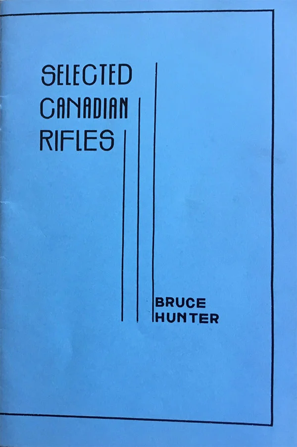 (Image: Book cover of Selected Canadian Rifles in blue with letraset black lines in oultine and decorative verical black linesin the middle.)