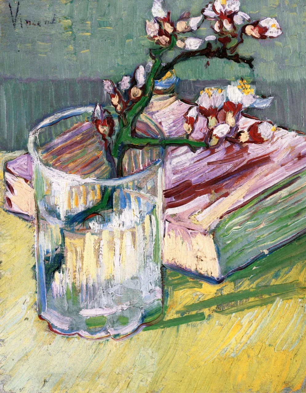 Blossoming Almond Branch in a Glass with a Book.jpeg