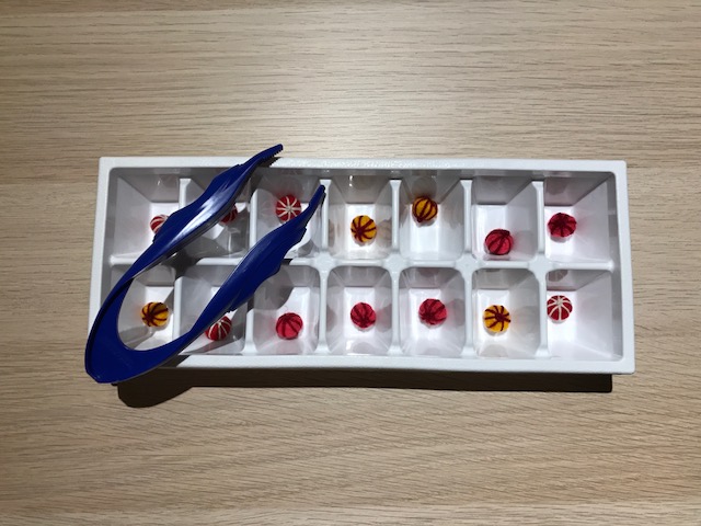 Big old tweezers! It usually takes a little bit of couching for kids to master the tweezers. These ones have great finger grip spots that help the kids know where to hold on.