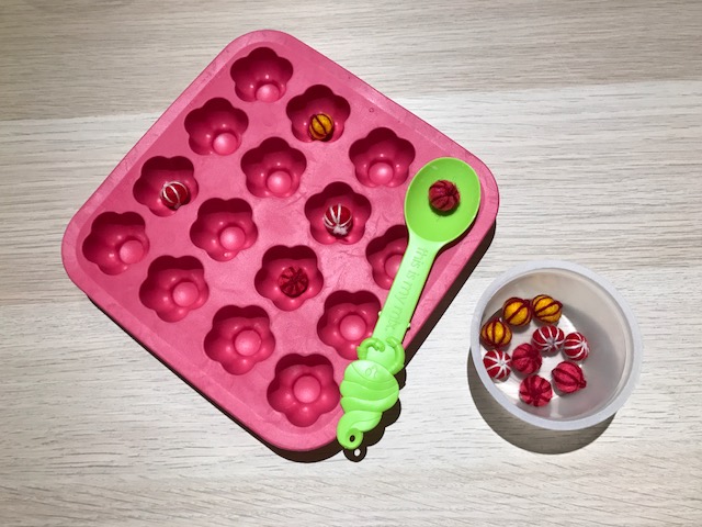This one can be tricky for some kids but its great practice for feeding themselves too! It requires a little more wrist action with scooping the puffball and then dumping in the flower.