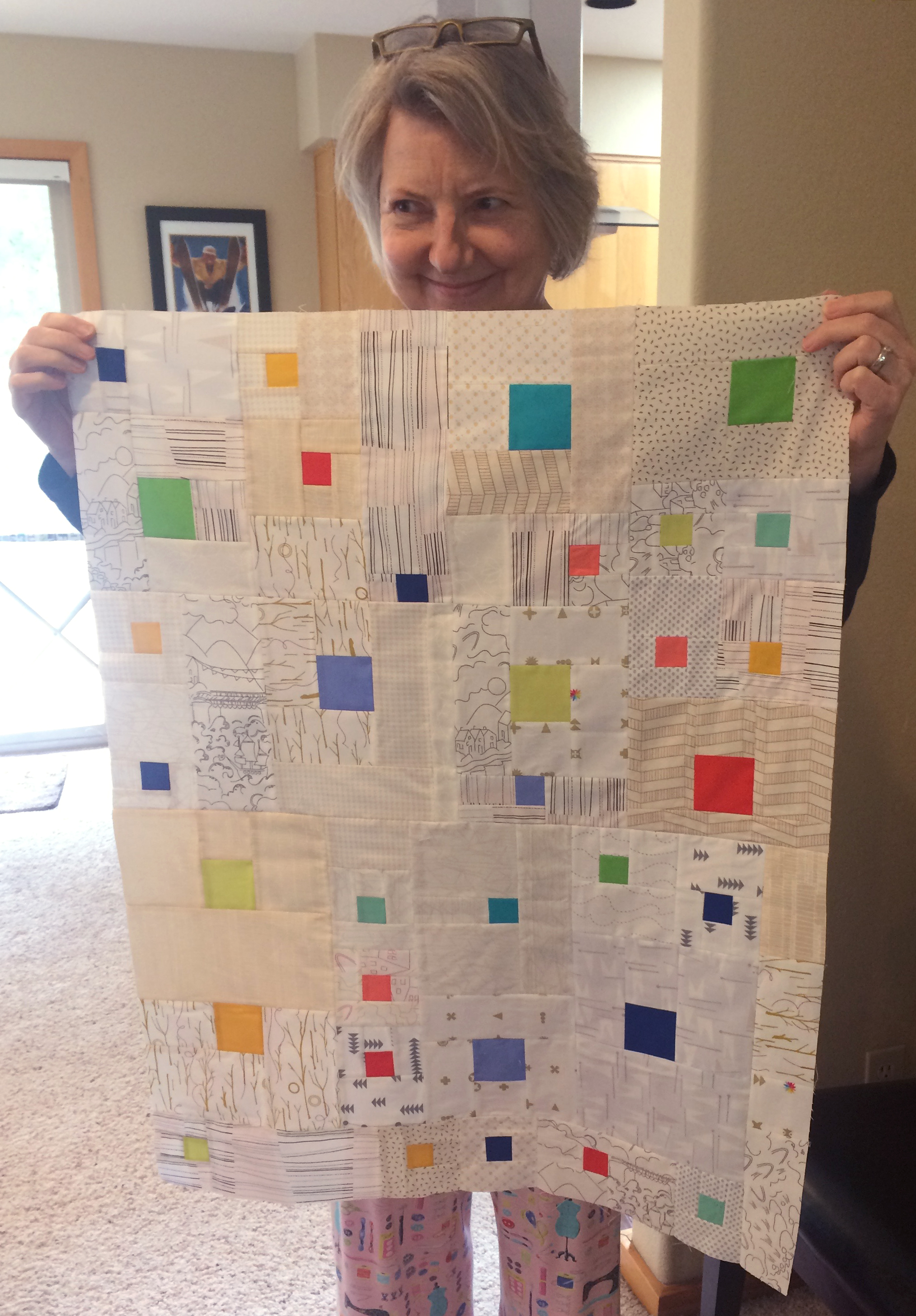 This cute little baby quilt creation is called "Gender Neutral Hipster".