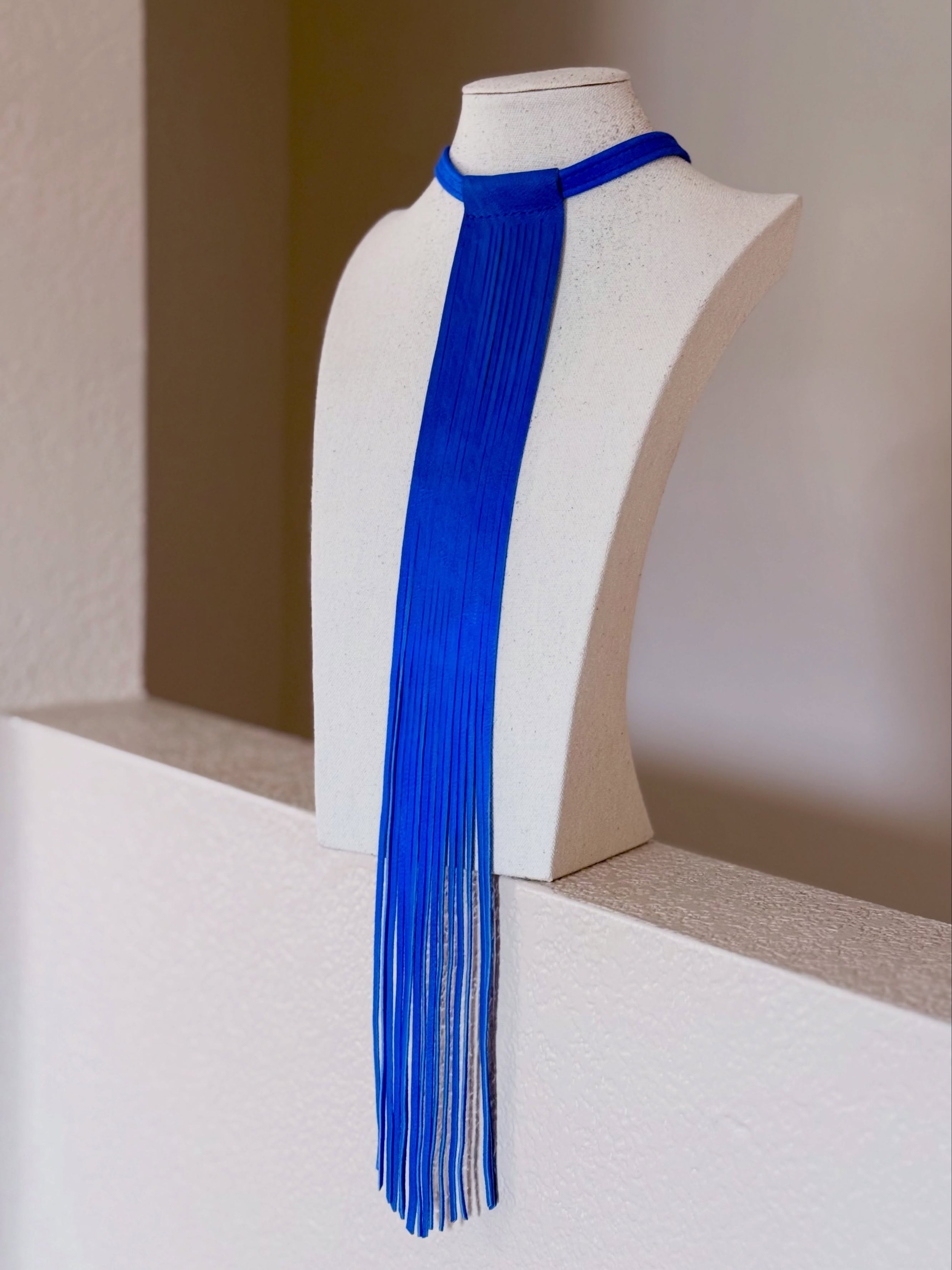 Another collection sneak peek 👀✨

💎 Royal Blue Lion Tie 💎

The DEVOTION collection drops a week from Friday on May 22nd at 9am. There will be a limited number of these gorgeous blue fringe pieces available.

See you soon. 
Xx,
Magenta