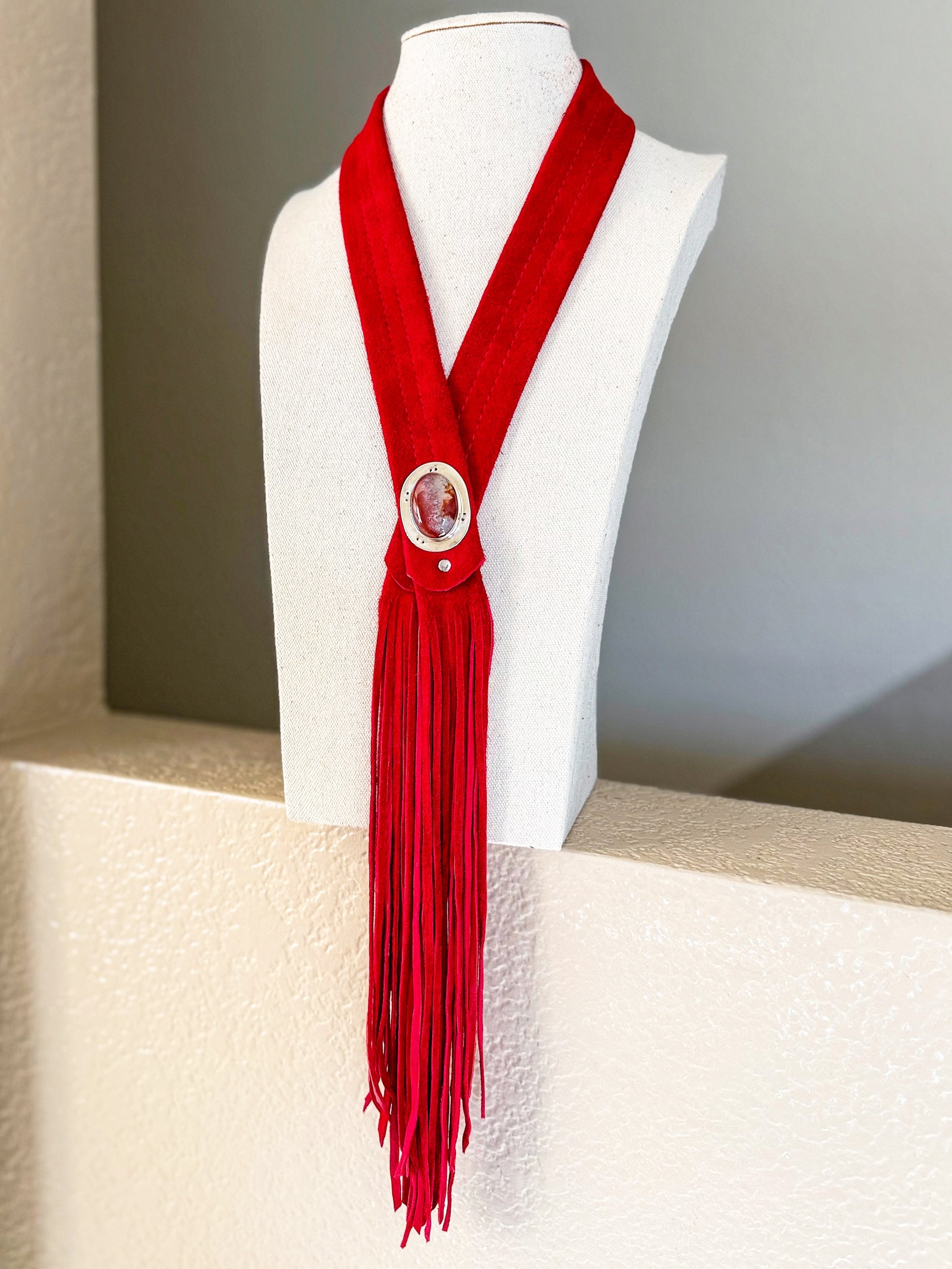 Royal Red 👑 Agate Fringe Bolo 
✨the Devotion collection✨

Red banded agate on royal red deer leather. The full grain leather is flipped so the suede is on the outside, allowing for a gorgeous velvety red texture. 

The agate is set in sterling silve