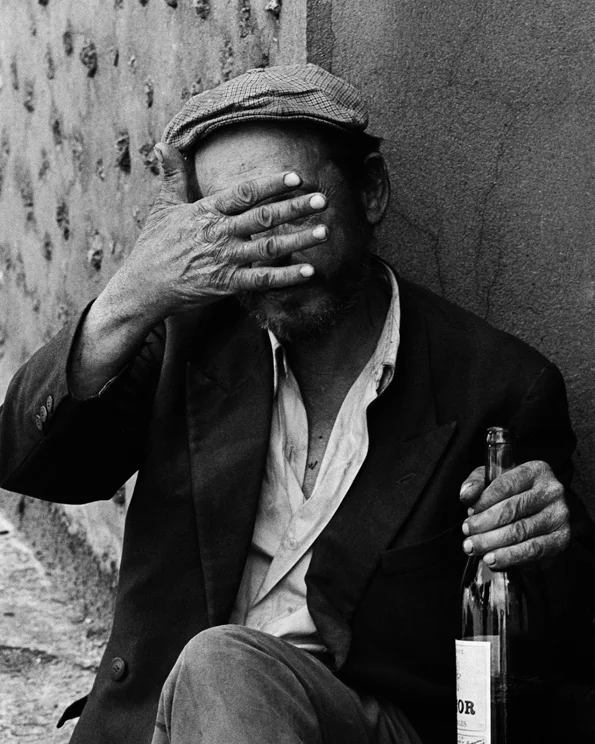 ManwithHand_8x10.jpg