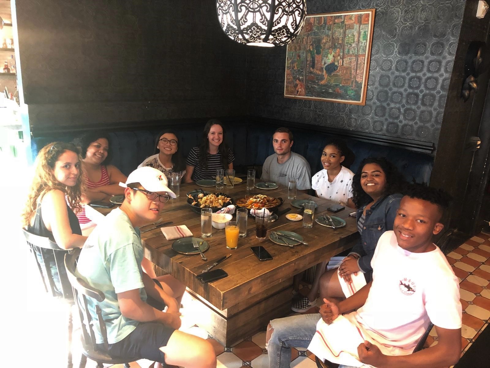 Alicia and Fellows enjoying a group meal