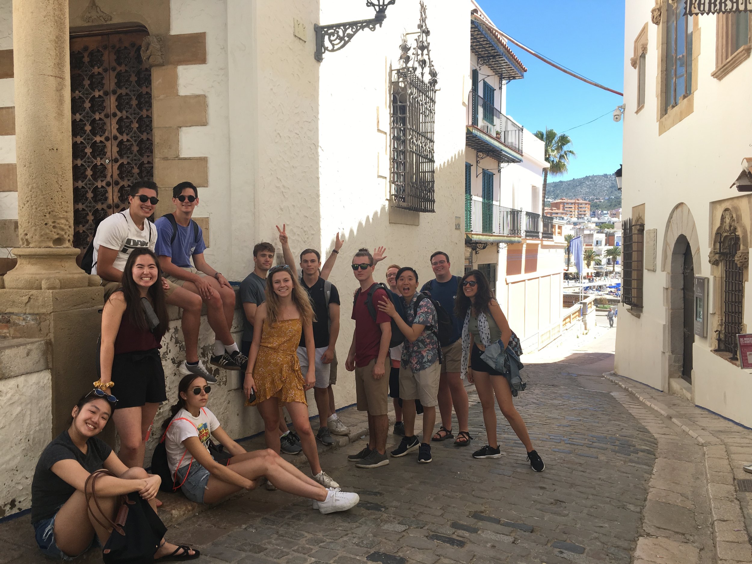 Fellows rest during weekend excursion to coastal town of Sitges, just south of Barcelona, July 2019. (Copy)