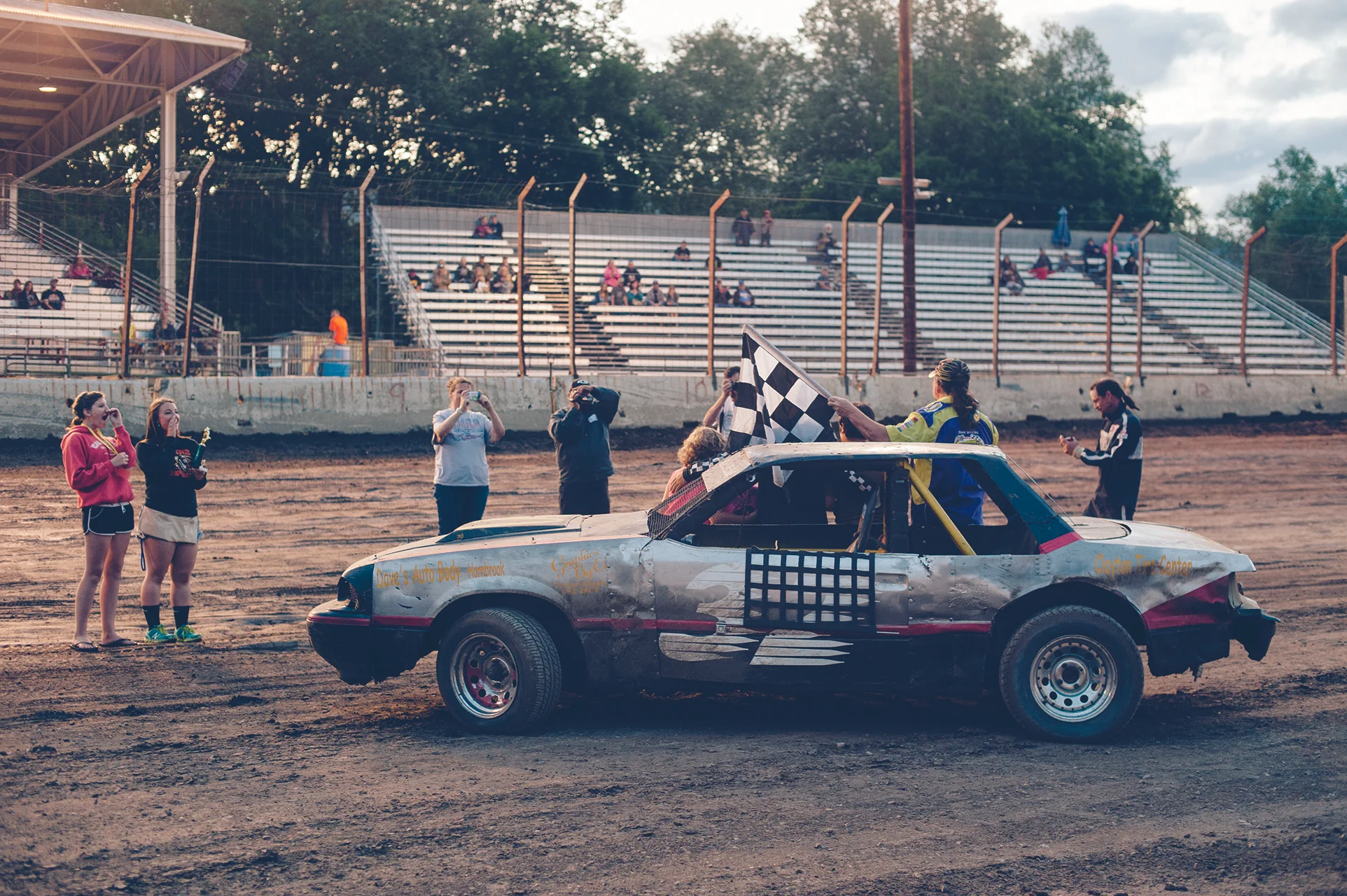 Anthony Whitaker and friends celebrate his mini stock victory at Yreka.