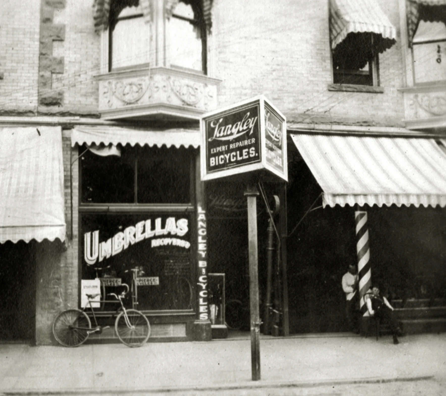 The outside of Langley's shop on 10th Street between I and J streets in Sacramento circa 1906 before he began selling motorcycles. At the time he was carrying on the family business of umbrella and bicycle repair and was the agent for Sterling bicycles.