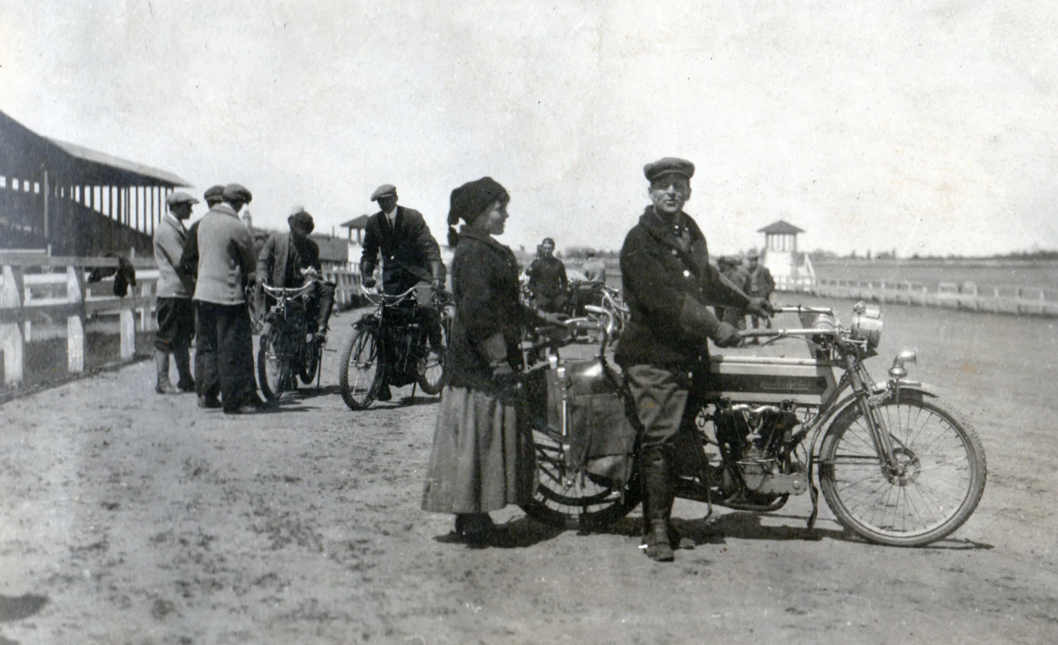 William and Elma at the track during race week. Langley served as a scorer at the races during the years he was involved in the business.