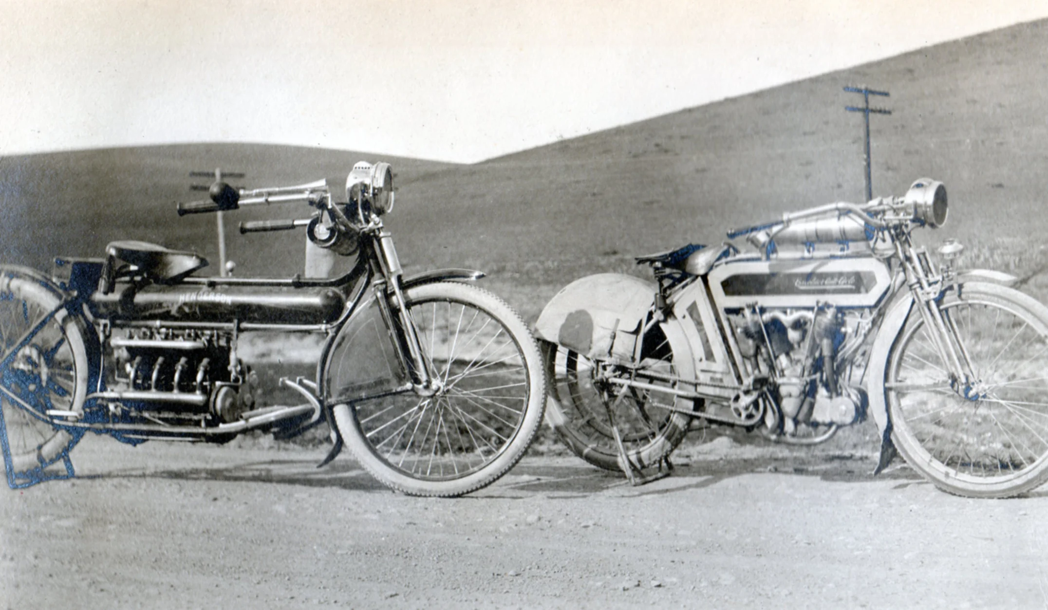 Out on the road. A first model 1912 Henderson and an Excelsior twin loaded with acessories.