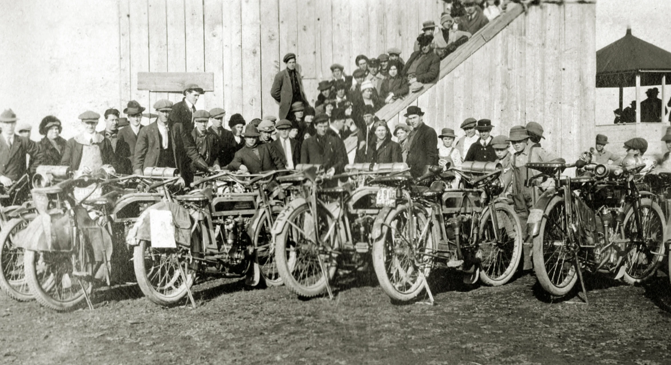 The scene behind the stands at the national championship races in 1913. These are Langley's customers who rode out en masse.