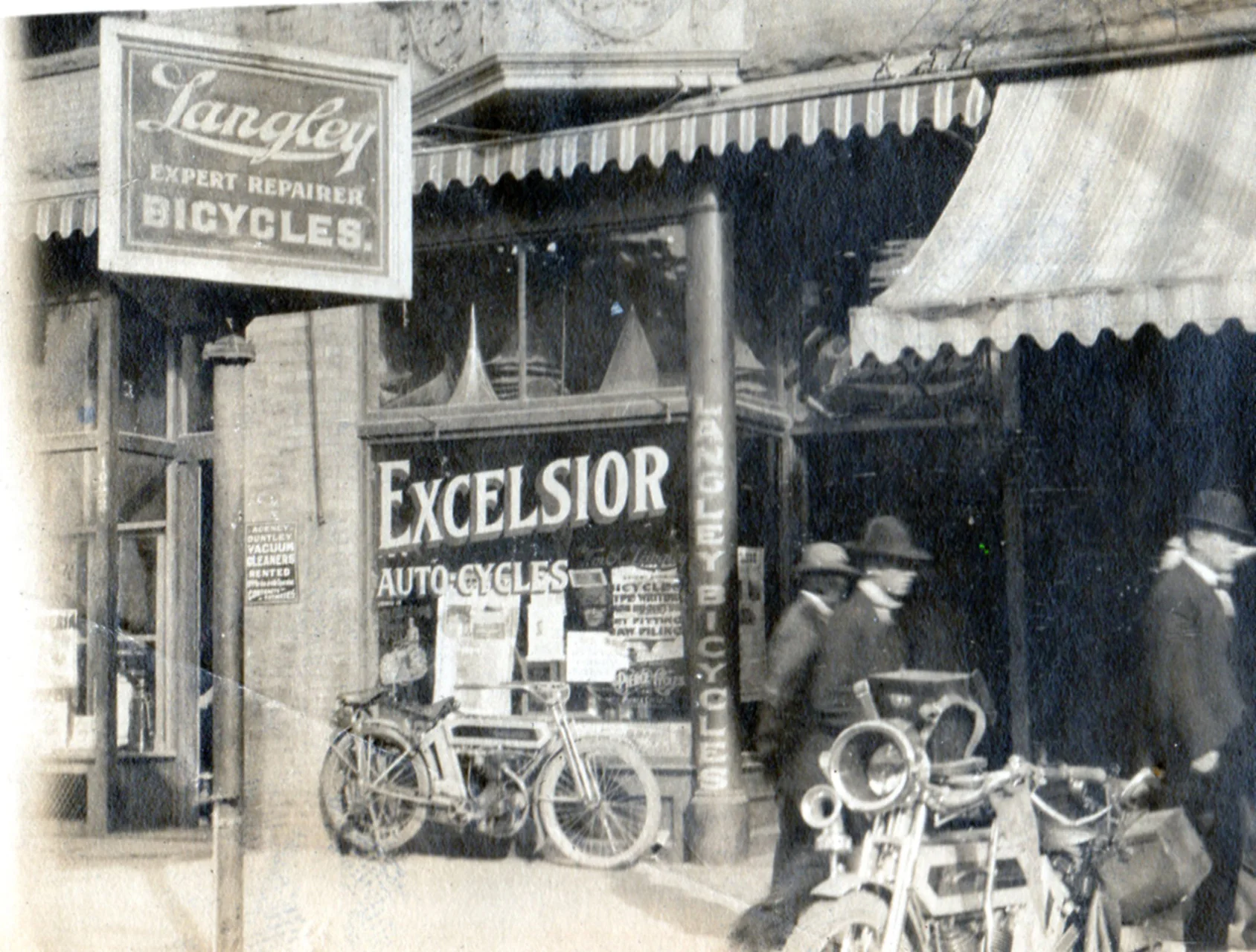 Langley's shop in circa 1908 after he became one of the first agents in the country for Excelsior motorcycles.