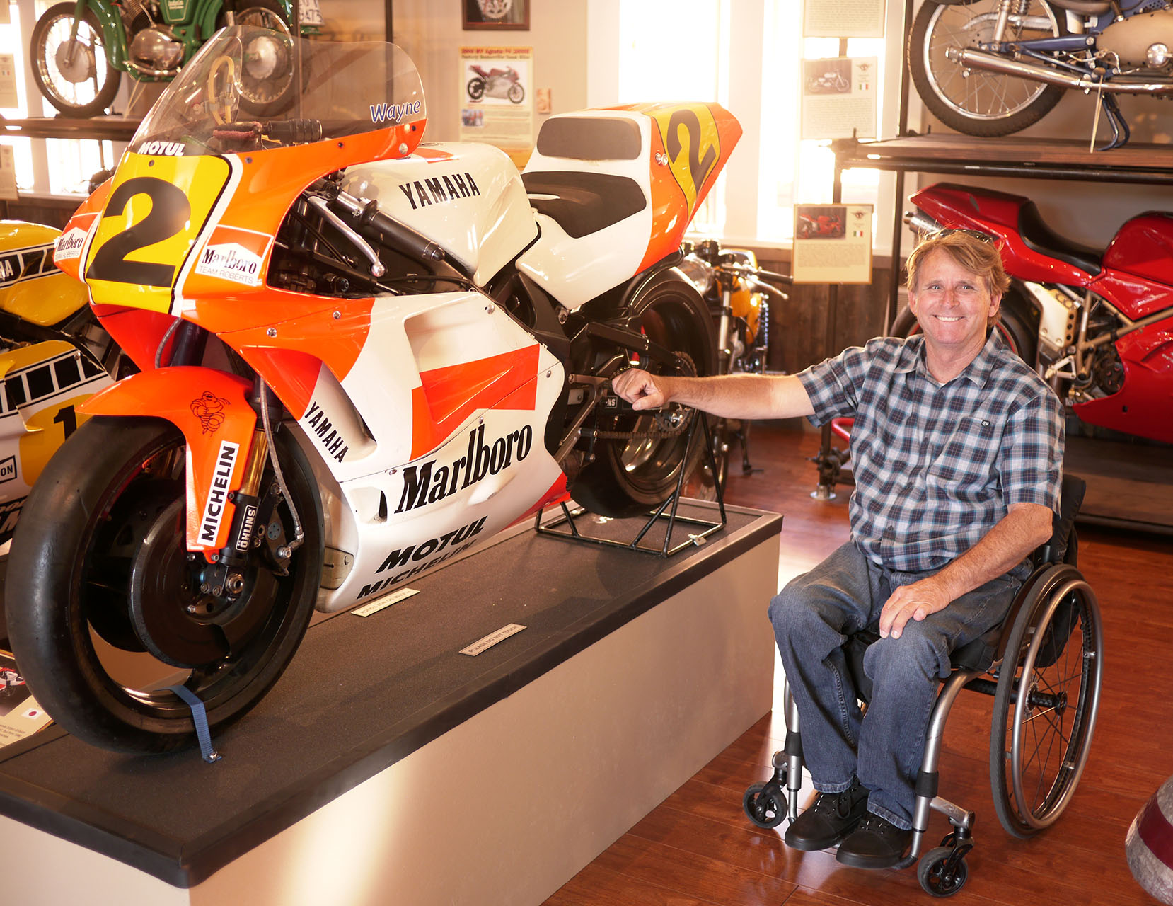 Three time world champion Wayne Rainey and the bike he rode to his first world championship in 1991. The fearsome two stroke Yamaha YZR500. Rainey is still very involved in racing as the supremo of the new racing organization Moto America.