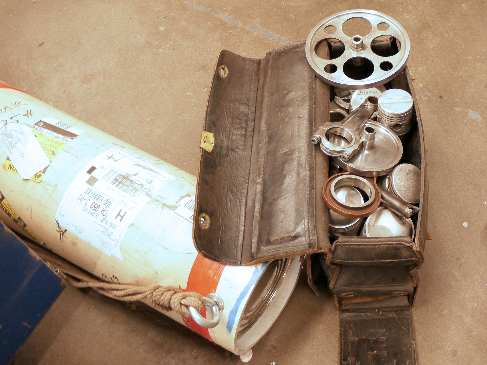 "The Bag" Long's teaching aid of rare mechanical engine parts.