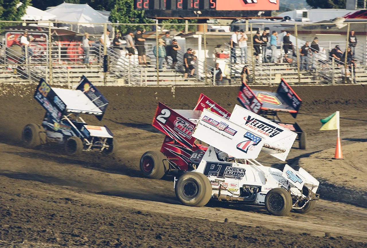 Forsberg (7c) leads a pack of winged sprints during a heat race at Ocean Speedway in Watsonville, 2016.