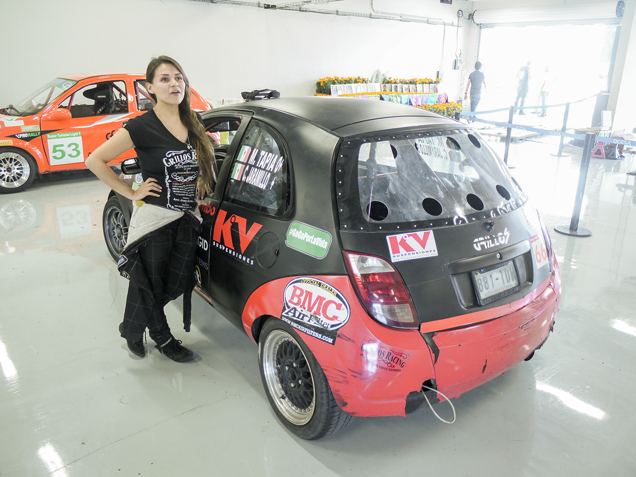 Driver Marta Tapia in between races. There are a number of women drivers in the Super Touring series.