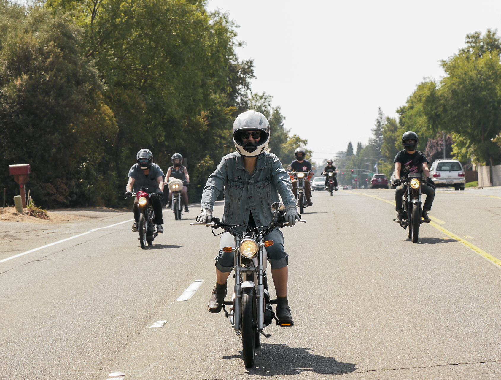 Coming at you. Moped rally.