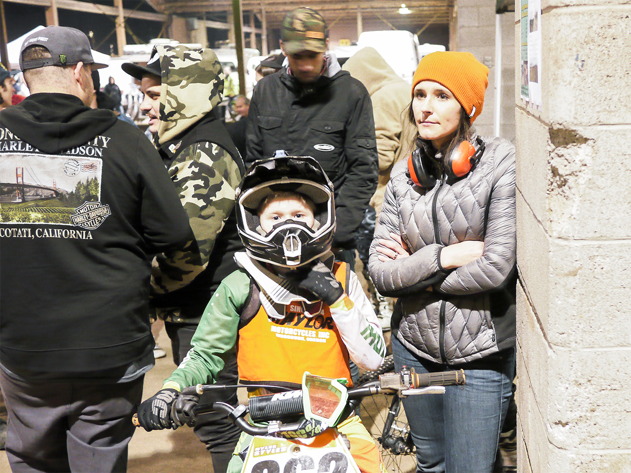 Racing at this level is a family affair. Frankly all racing is a family thing to a greater or lesser extent. A young fellow waits with his mom for his heat race.