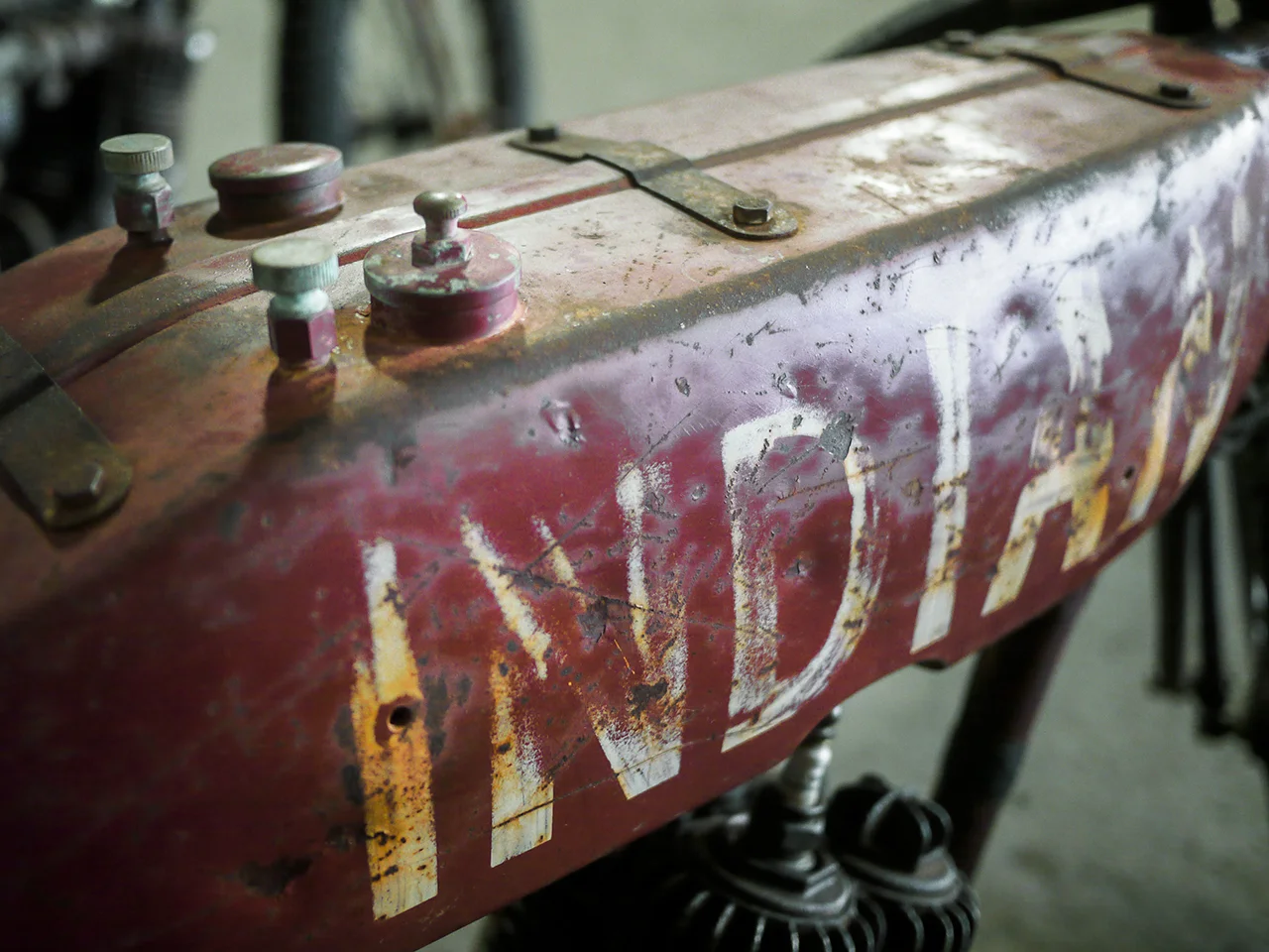 Adam Hughes' 1919 Indian tank in all its well-loved glory. One Moto is not just about shiny, techno-boutique custom gingerbread.