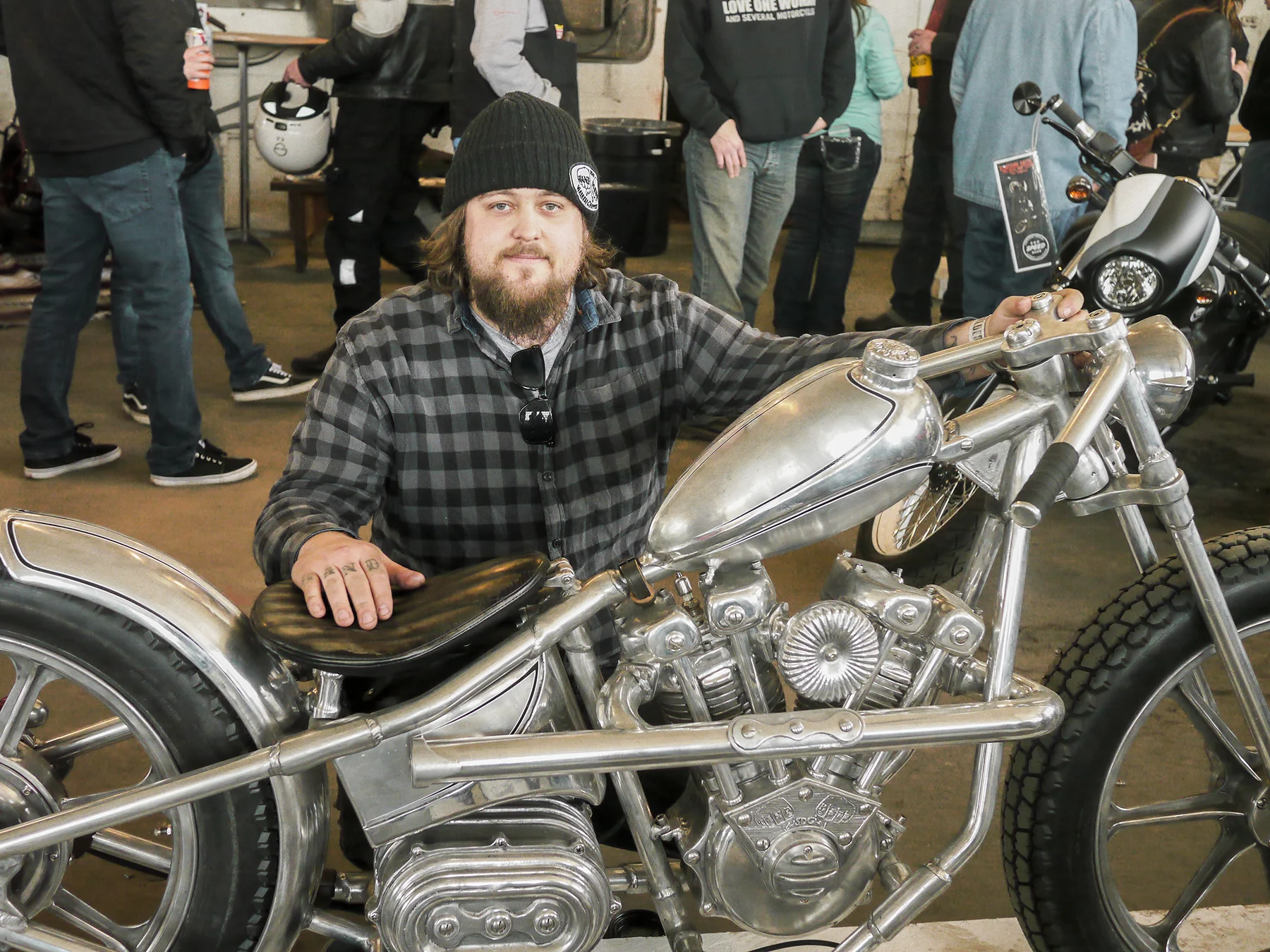 Motorcycle builder and machinist Ricky De Haas with his electric powered creation. The attention to detail in the castings is amazing.