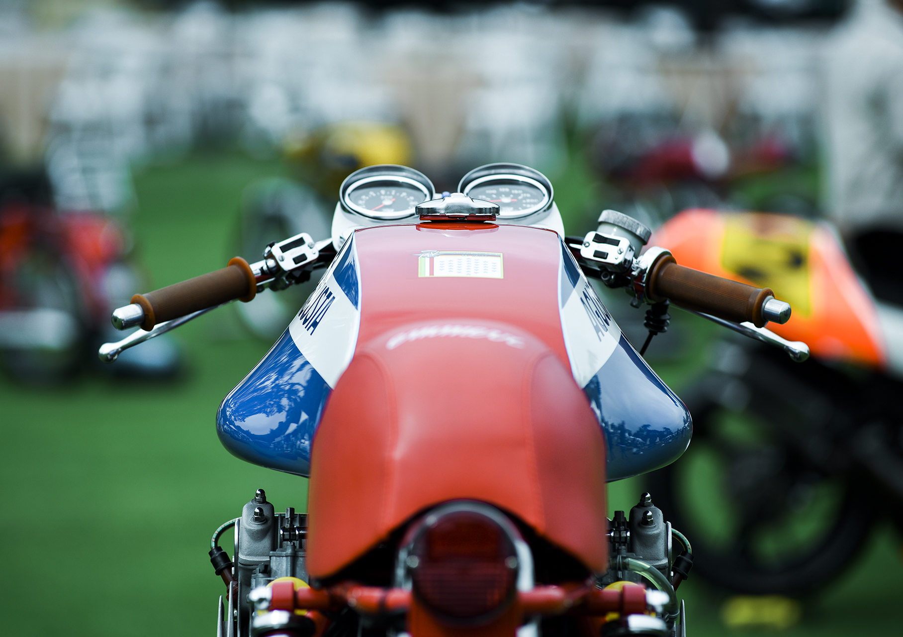 Magnificent disco volante style fuel tank on Simon Graham’s 1974 MV Agusta 750s on display in the circle of champions. This bike won Best of Show at the 2012 Quail Motorcycle Gathering.