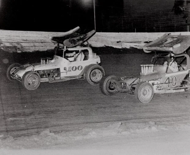 Wally Baker (100) races with Gary Patterson at West Capital Raceway. (photo courtesy: West Capital Raceway Alumni Association)