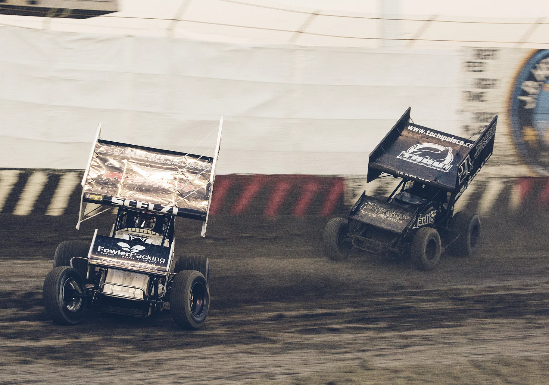 Dominic Scelzi leads Carson Macedo into turn three at Thunderbowl Raceway during a King of the West Series heat race, 2015.