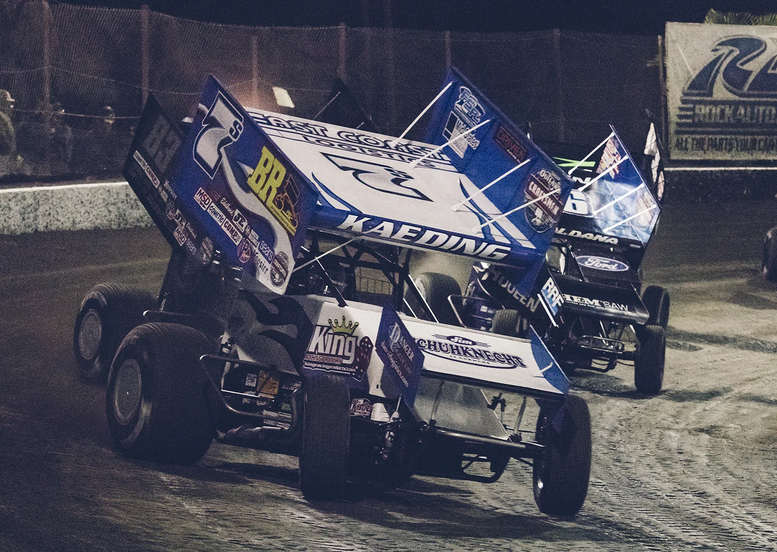 Driving for Sides Motorsports, Tim leads a pack of Outlaws during a heat race at Bakersfield, 2018.