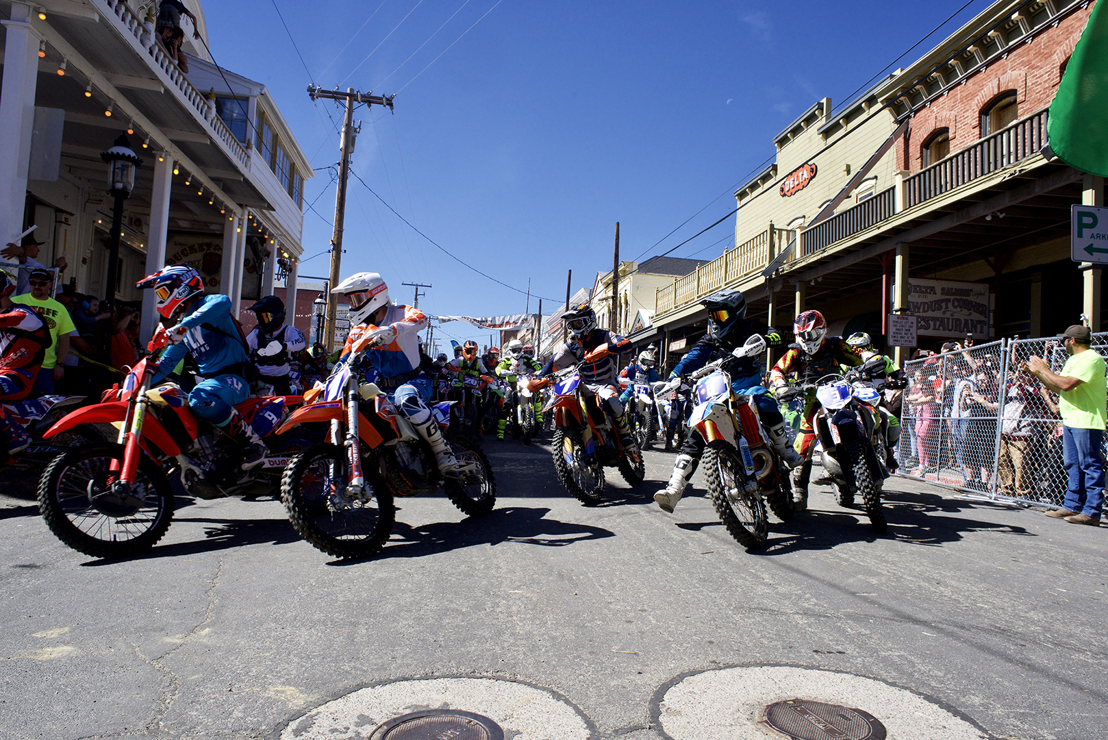 The front row heads out at the green flag. All the riders line up along C street which brings the excitement and drama of the start to the heart of Virginia City. 