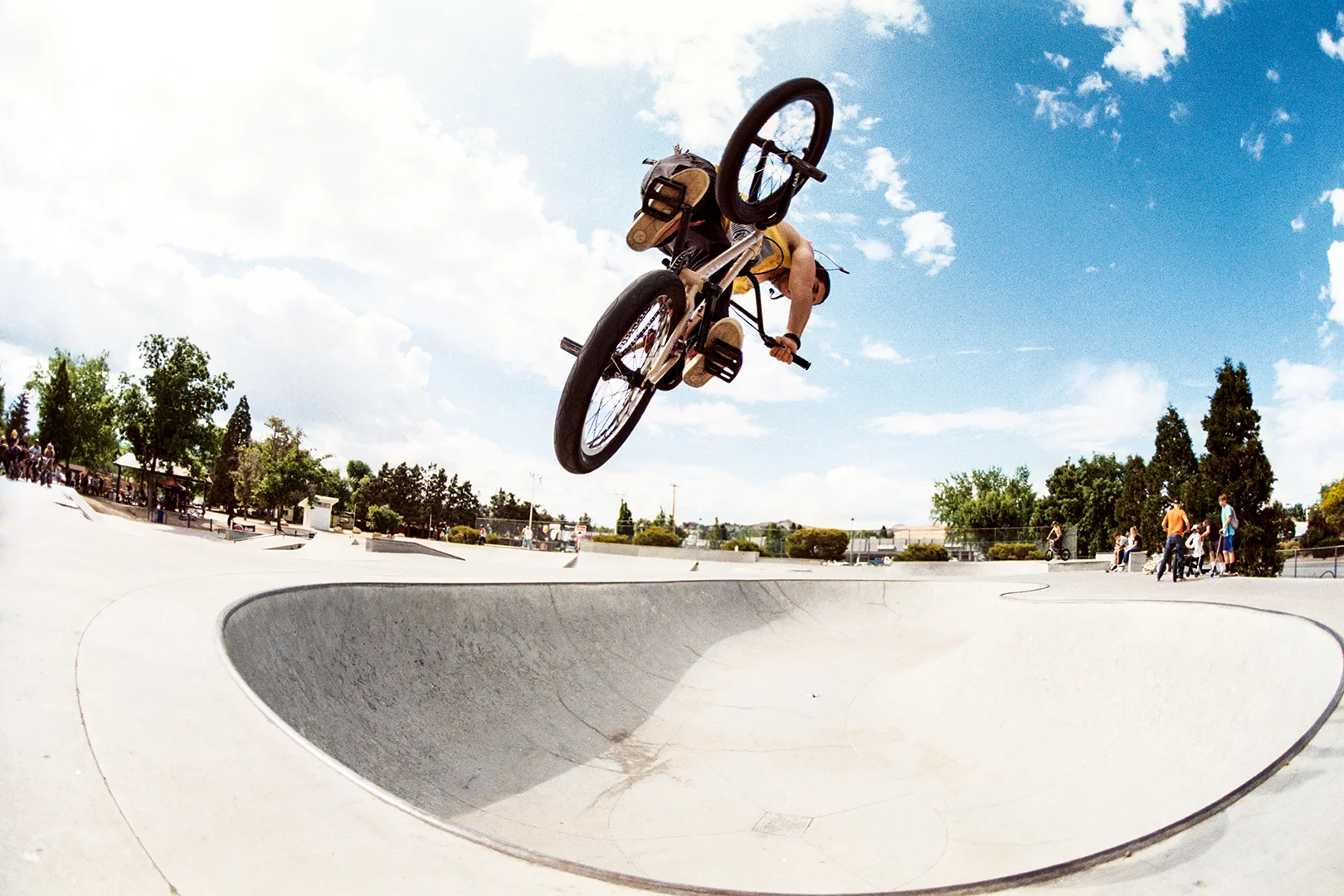 This is a local kid named Chad Curtis. We all went up to Reno for a BMX jam and Chad has been working on his "turndowns" so I told him to snap one in the deep end of this bowl. This was with the Nikon FM2 and the 16mm Nikkor.