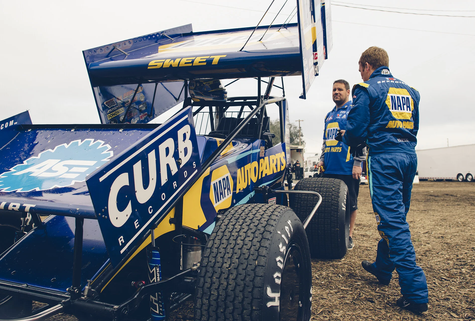 Ready for work: Sweet in the pits with crew chief Eric Prutzman at Thunderbowl Raceway in Tulare, Calif., March 2019.