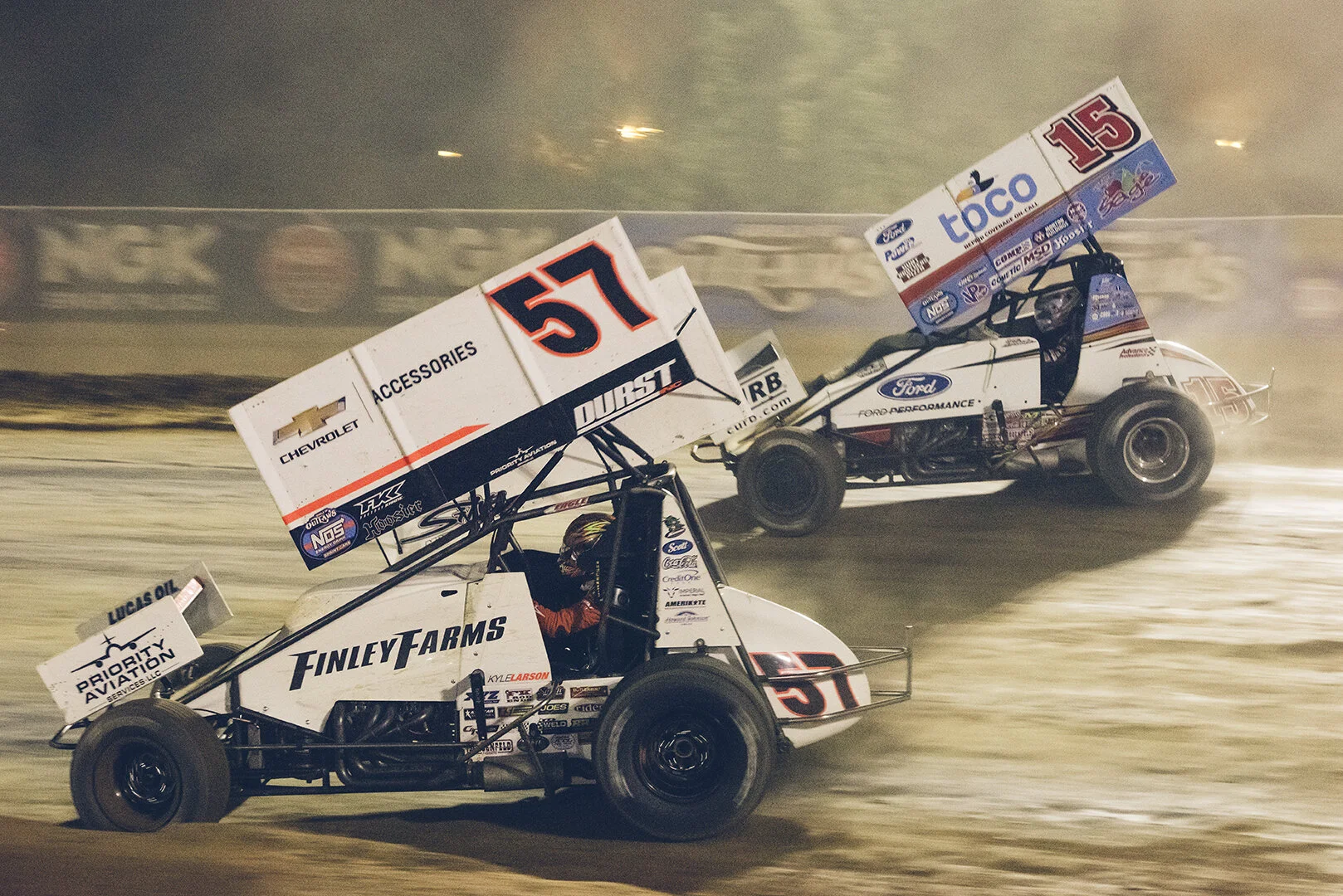 Main event action: Larson battles for position with Donny Schatz.