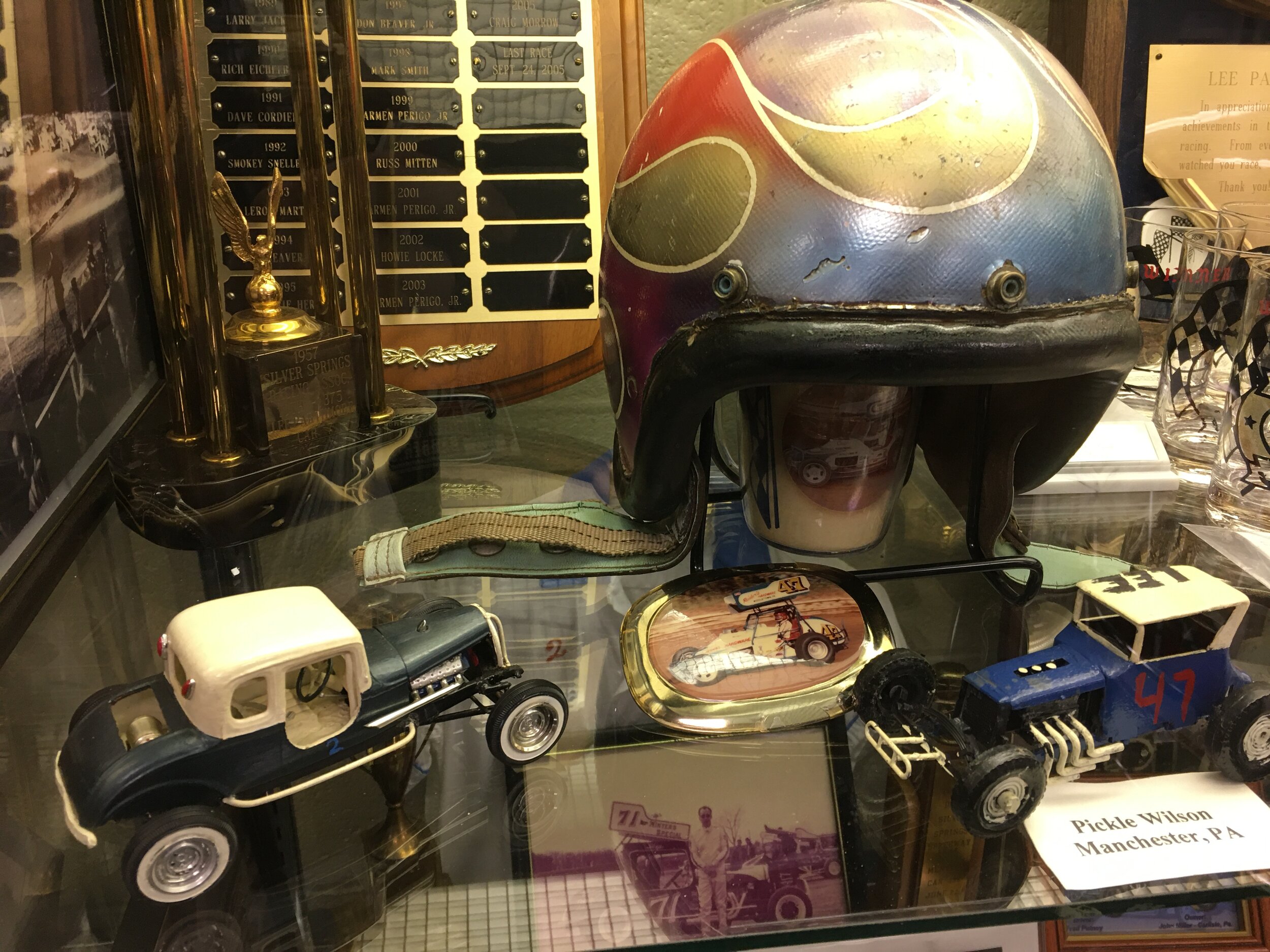  A well worn helmet and some hard top models make for a great display. 