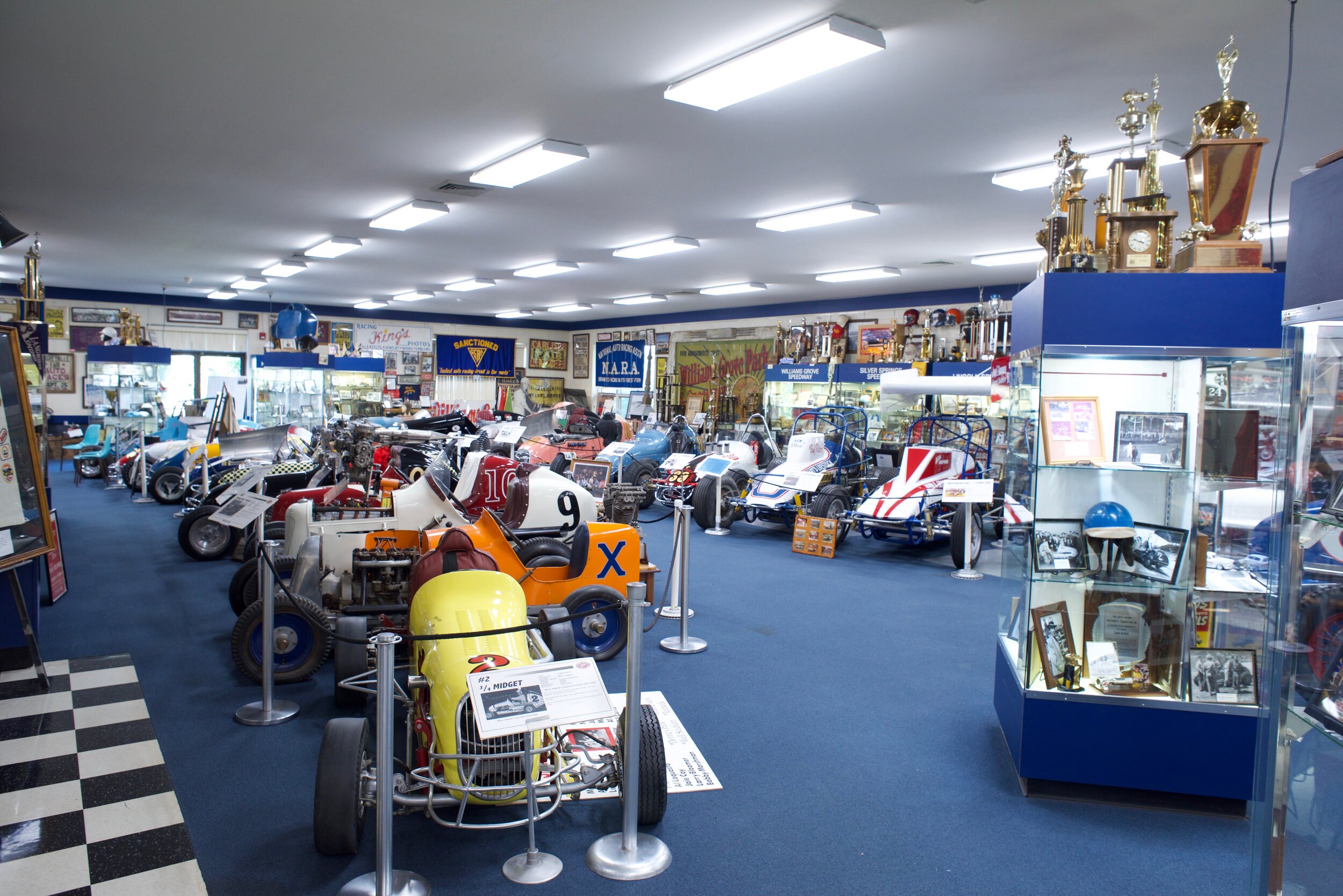  The main room at the museum is packed with race cars and displays of gear and memorabilia. 