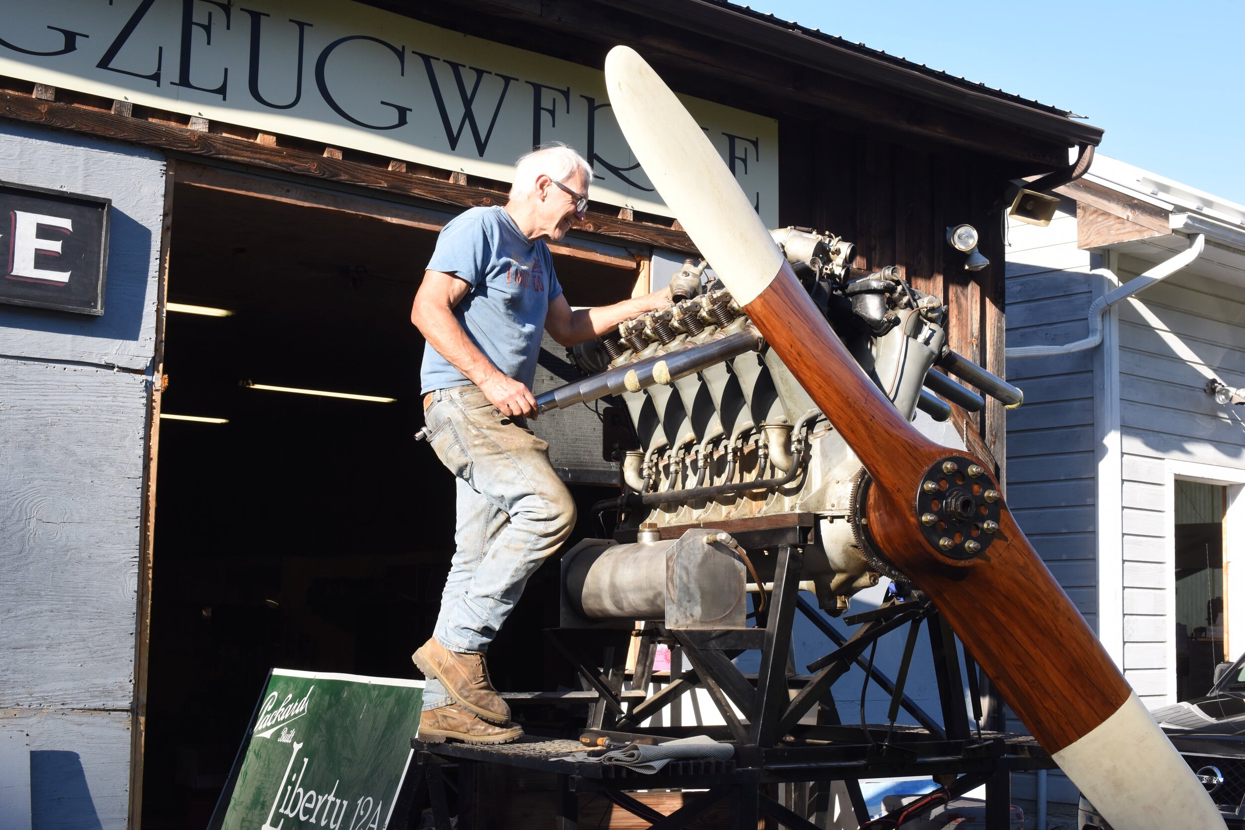  Kurt Muller fixes an intake leak on a stand-mounted Liberty engine. 