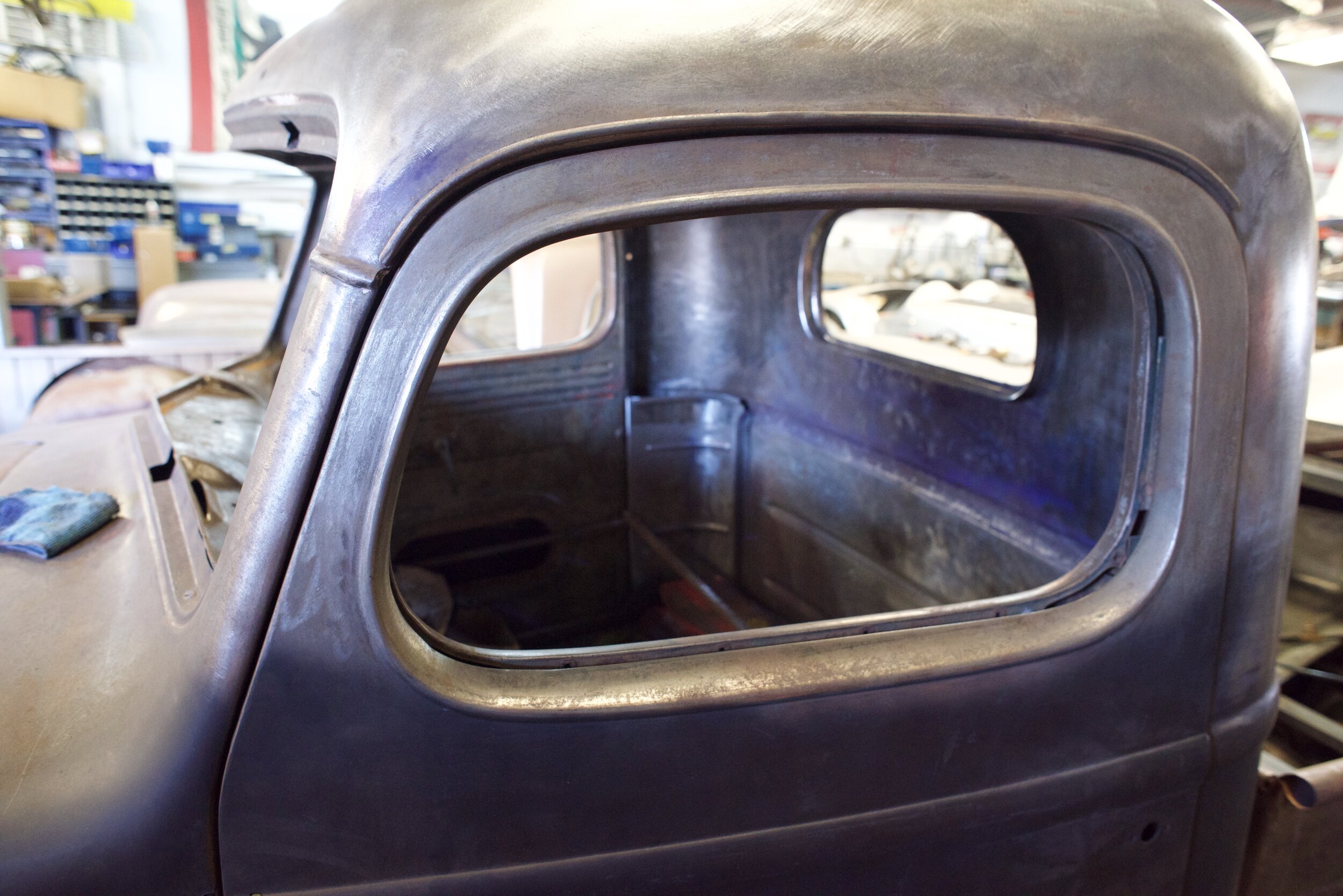  1948 International Harvester pickup is having its body straightened out and a new chassis made to fit. 