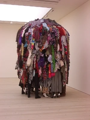 "Pile of Clothing" by bixentro on Flickr is licensed under CC by 2.0