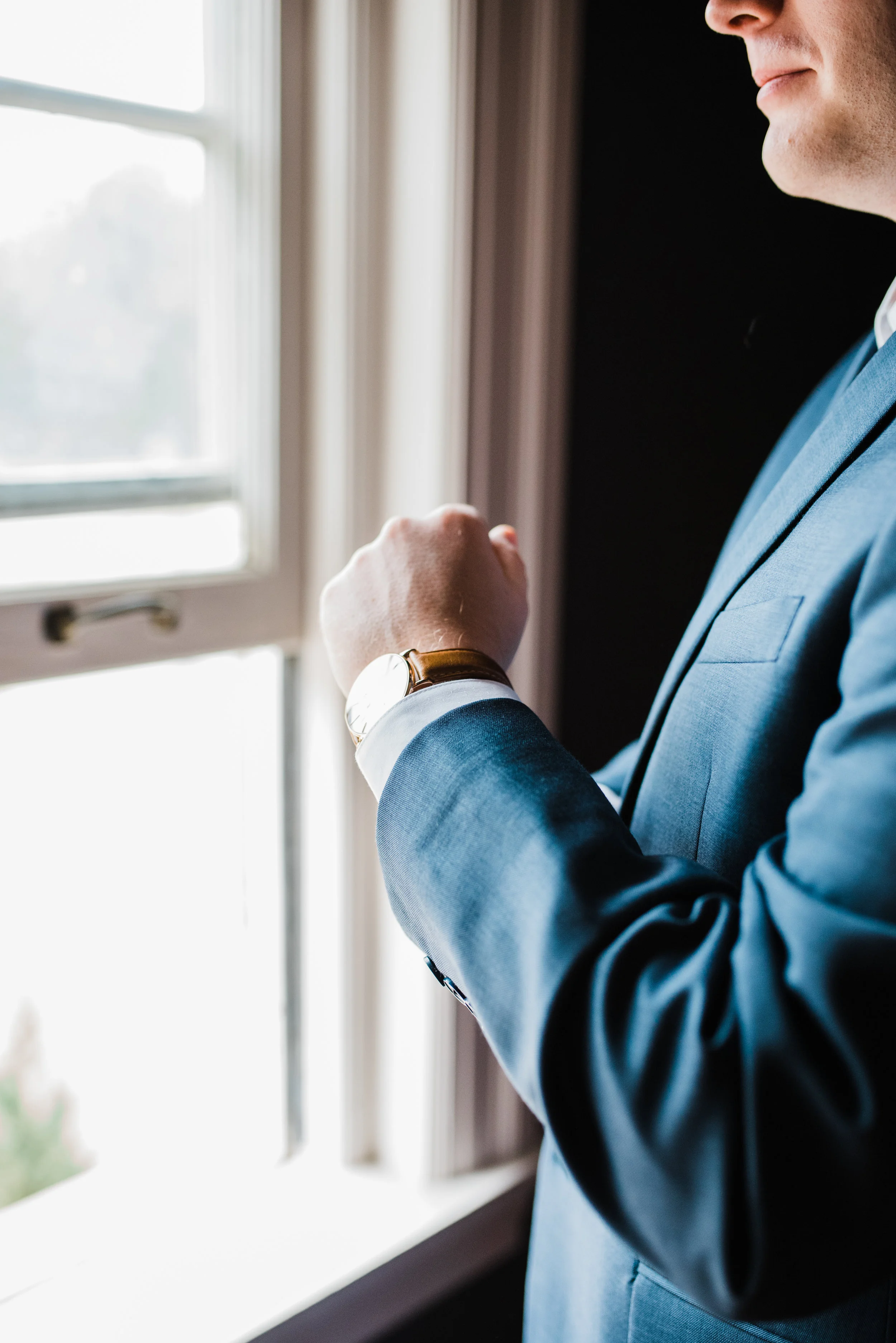 Groom getting ready at Highland Park Country Club