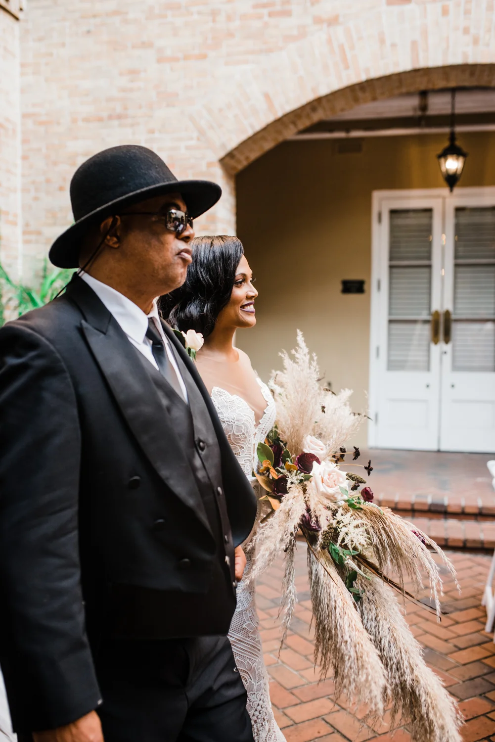 Bride walking down the isle at The Carlisle Room
