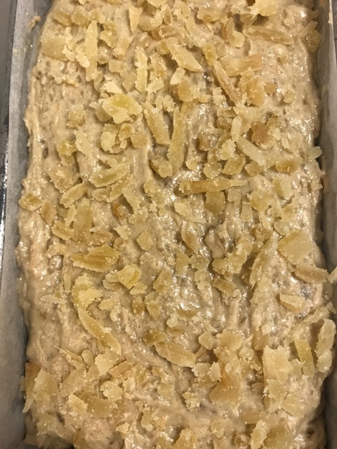 in the pan, topped with crystallized ginger