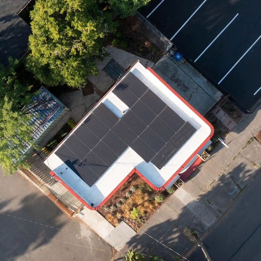 7:00pm today marks exactly one year since we energized our solar system, and we are officially NET ZERO! Conventional modeling showed that the system would only provide 60% of our power.  This was a testament to the effort we put into the building's 