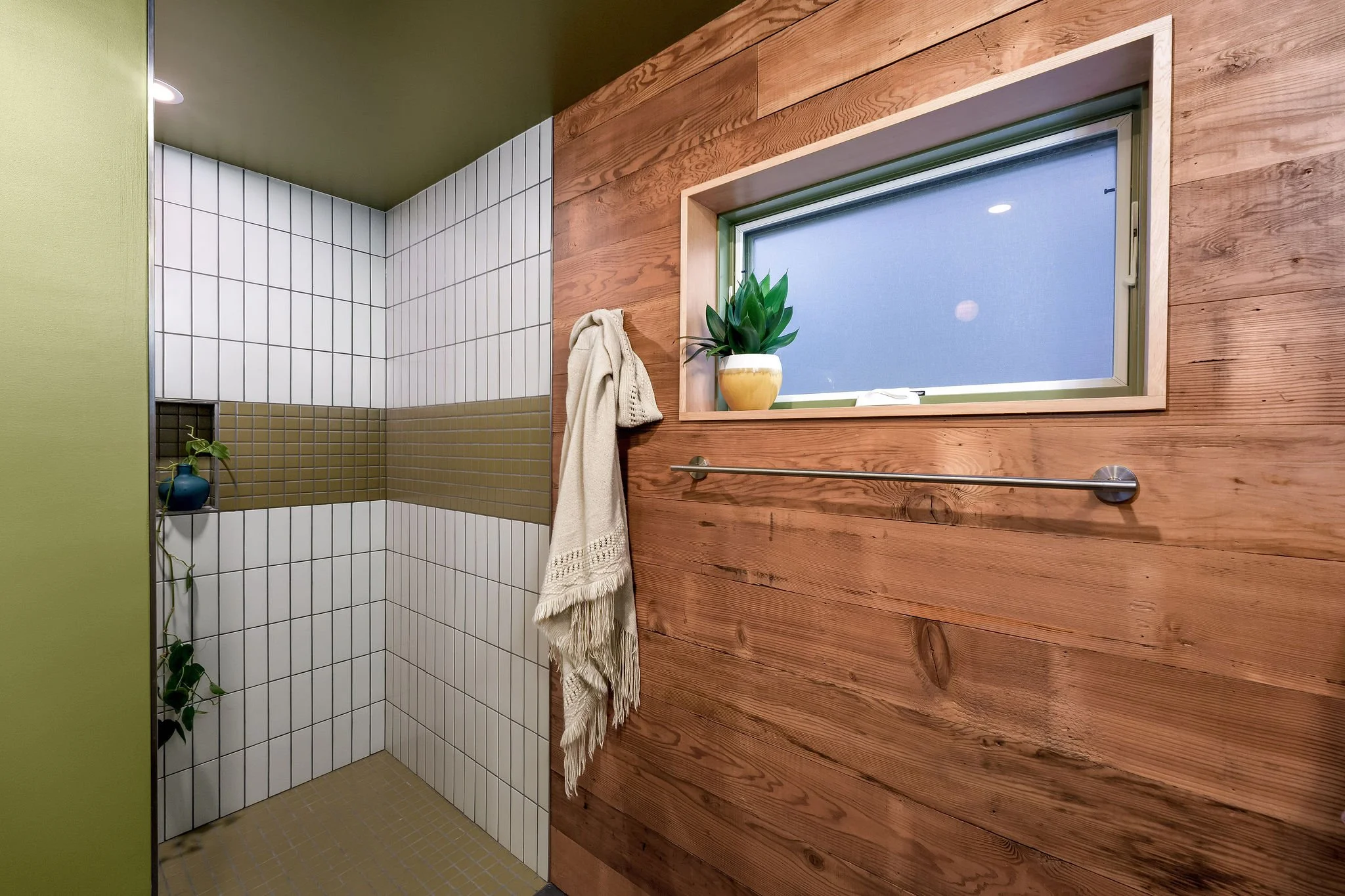 Artisanal earth tones tile and fir wall boards