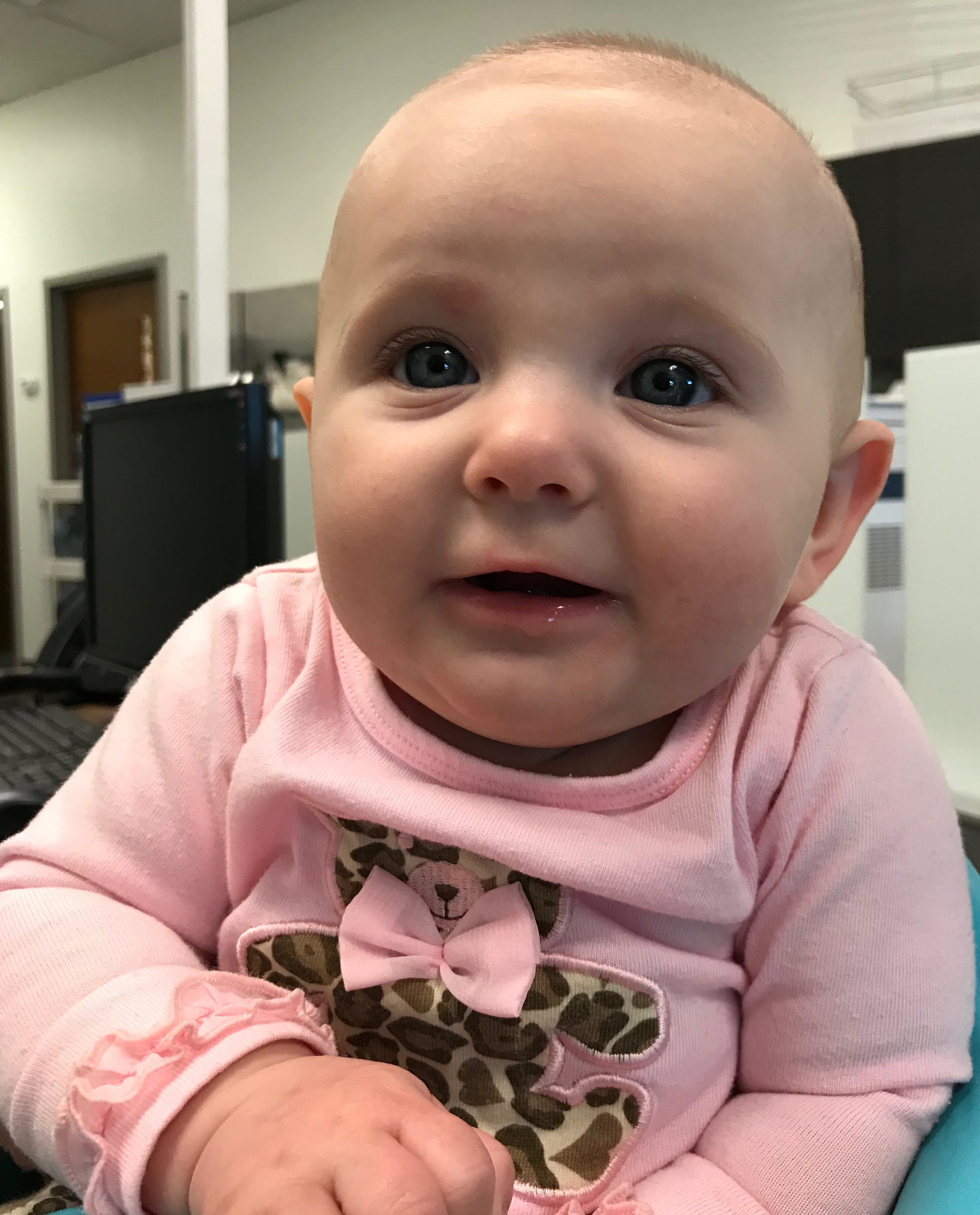 My daughter, the newest office baby, at 4 months old.