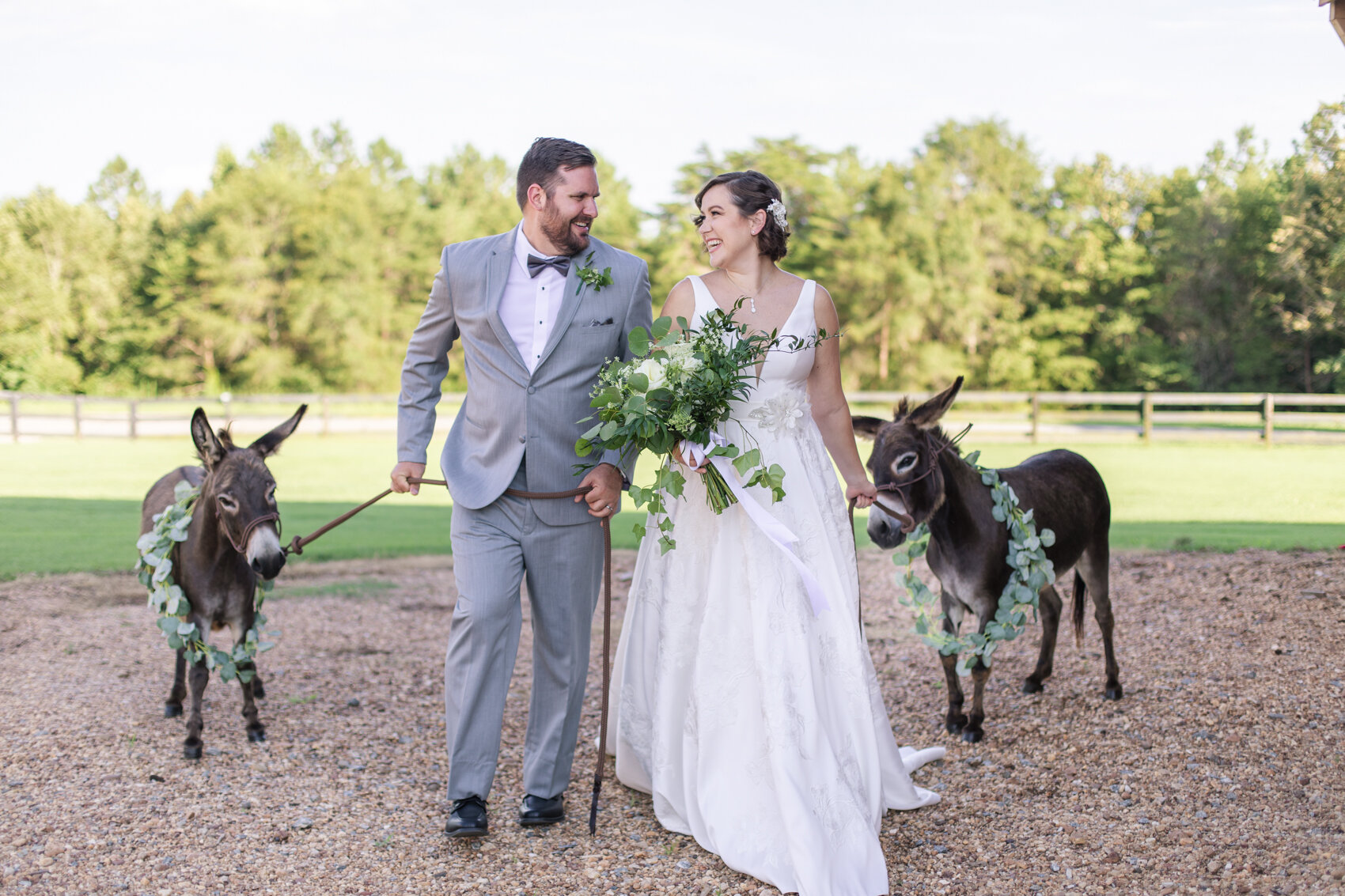  I love how happy Karyn and Kyle are and how into it they are, to the contrast of how much the donkeys are not LOL. This was Poppy and Beans first photo shoot and they were a little afraid of her dress. But they are adorable none the less. SO sweet! 