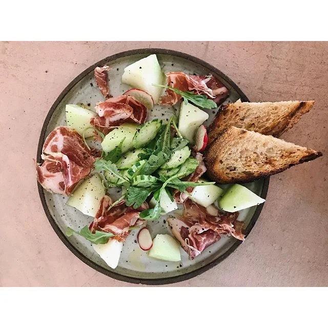First things first - today's special : desayuno de campeones feat. piel de sapo melones, coppa, @jennasmuller's amazing polenta bread, serpent cucumbers and spicy arugula from @openfieldfarm 🤤🤤🤤 SEGUNDO: Hugo Street is having a BLOCK PARTY and we'