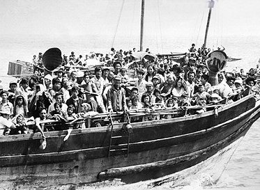 VIETNAMESE BOAT PEOPLE FLEEING THE FALL OF SAIGON 1975 PHOTO CREDIT: HISTORY LEARNING SITE
