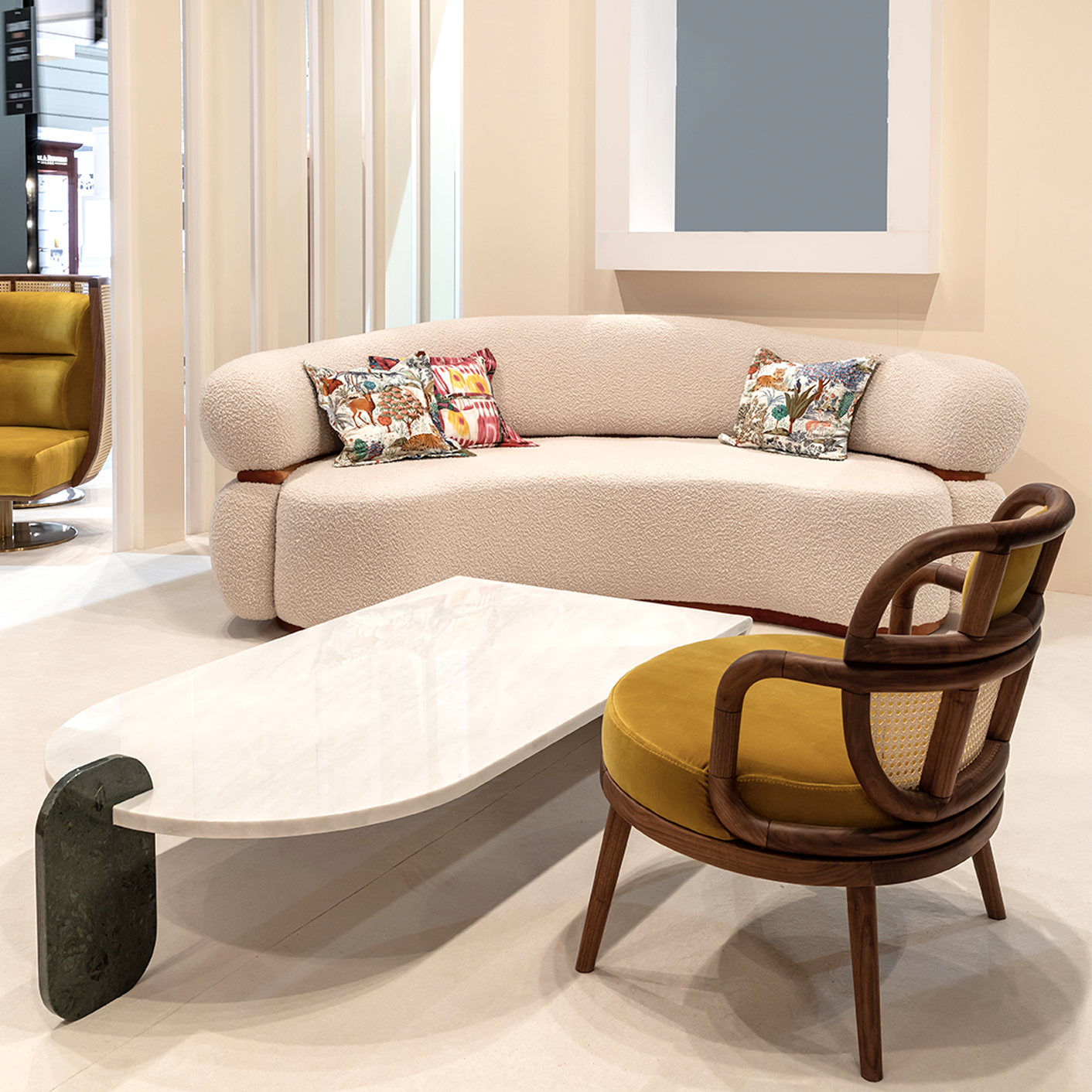 Malibu curved sofa-Havana Armchair- playing games coffee table- Marie Burgos collection.png